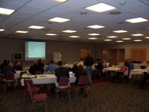 An internal participant, learning from an outside speaker